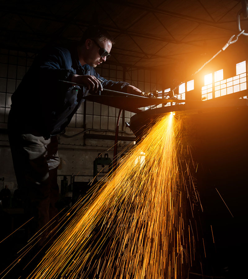 welder working in a warehouse